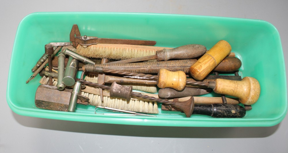 A group of assorted old and antique tools
